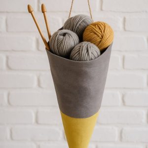 Olé & Co Linnen puntzak afgevuld met bolletjes wol en breinaalden